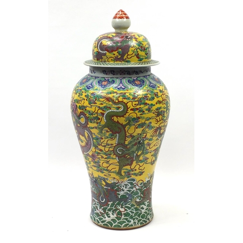 218 - Floor standing Chinese porcelain baluster vase and cover, hand painted with dragons amongst clouds a... 