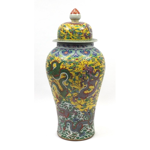 218 - Floor standing Chinese porcelain baluster vase and cover, hand painted with dragons amongst clouds a... 