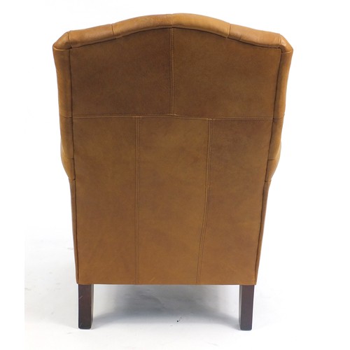 1332 - Brown leather club chair with tan button back upholstery, 100cm high