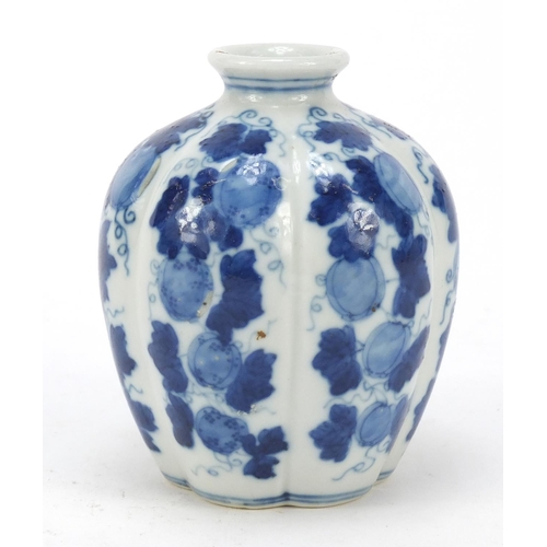 511 - Chinese blue and white porcelain vase hand painted with fruit and leaves, four figure character mark... 