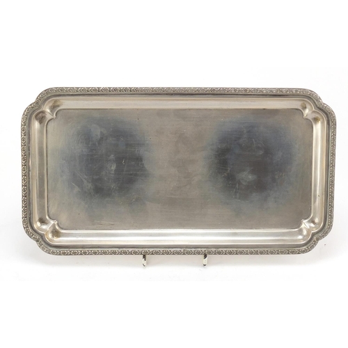 3083 - Persian silver tray with floral border, 30.5cm wide, 459.0g