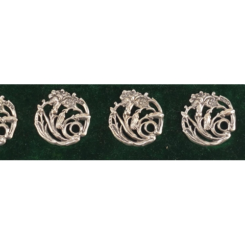 3028 - James Deakin & Sons, set of six Art Nouveau silver floral buttons housed in a silk and velvet lined ... 