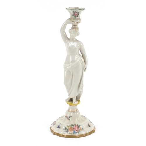 482 - 19th century French faience glazed figural candlestick in the form of a scantily dressed female, dec... 