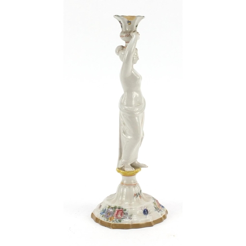 482 - 19th century French faience glazed figural candlestick in the form of a scantily dressed female, dec... 