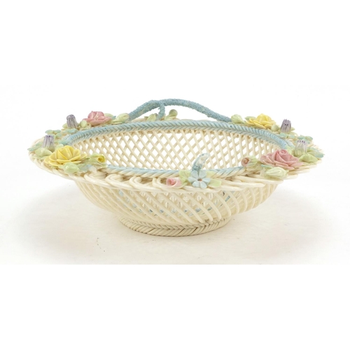 495 - Belleek first period floral encrusted pierced porcelain basket, 23cm in diameter