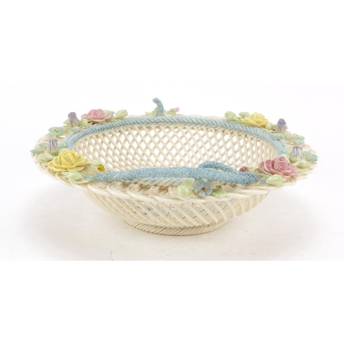 495 - Belleek first period floral encrusted pierced porcelain basket, 23cm in diameter