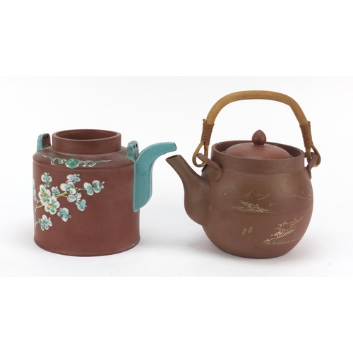 3785 - Two Chinese Yixing terracotta teapots including one enamelled with a bird and flowers, with incised ... 