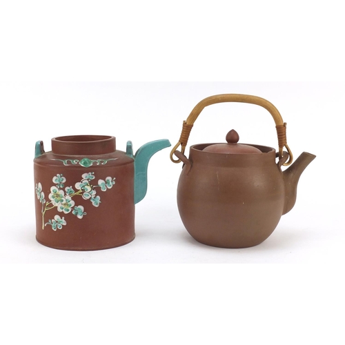 3785 - Two Chinese Yixing terracotta teapots including one enamelled with a bird and flowers, with incised ... 