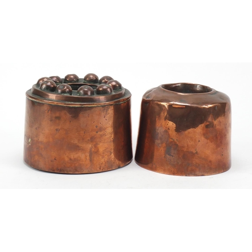 21 - Two 19th century copper jelly moulds, the largest 15cm in diameter