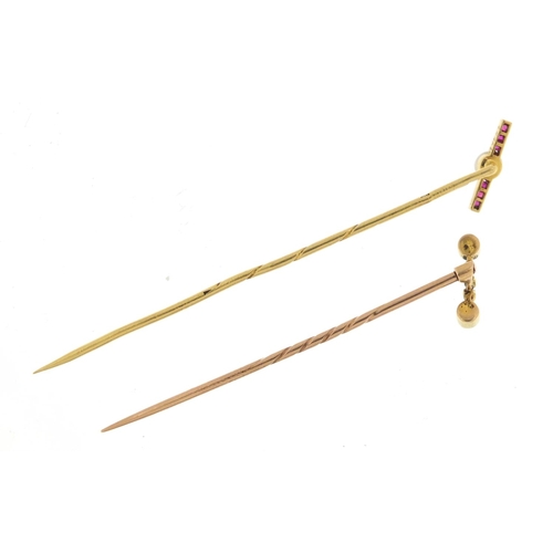 2363 - Two Art Deco unmarked gold tie pins set with rubies, pearls and emeralds, the largest 6.5cm in lengt... 