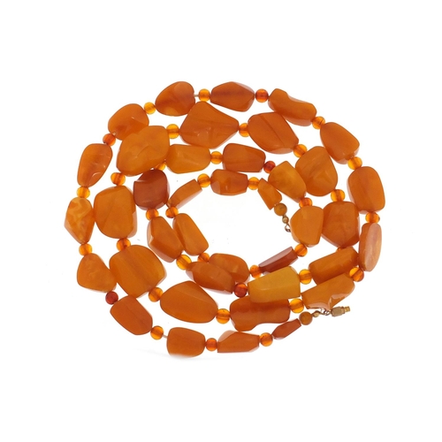 2365 - Butterscotch amber coloured bead necklace, 100cm in length, 71.2g