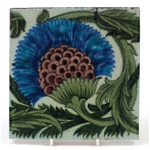 212 - William De Morgan, Arts & Crafts pottery BBB tile hand painted with a stylised thistle and foliage, ... 