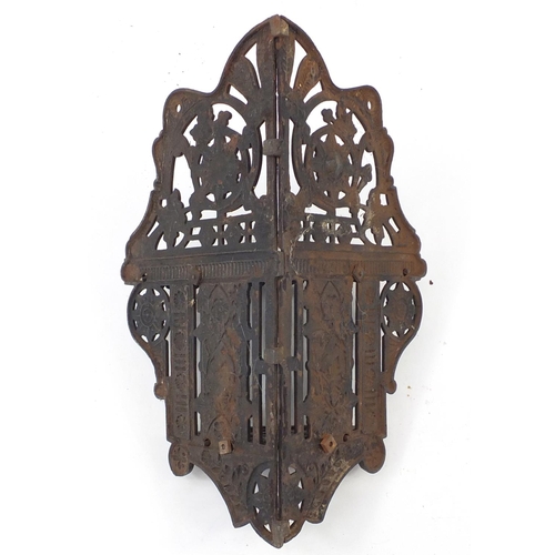 161 - Colebrookdale style cast iron hanging corner shelf cast with flowers, 40cm high