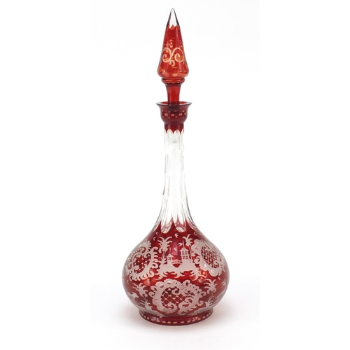 136 - Bohemian ruby glass decanter etched with wild animals and flowers, 34.5cm high