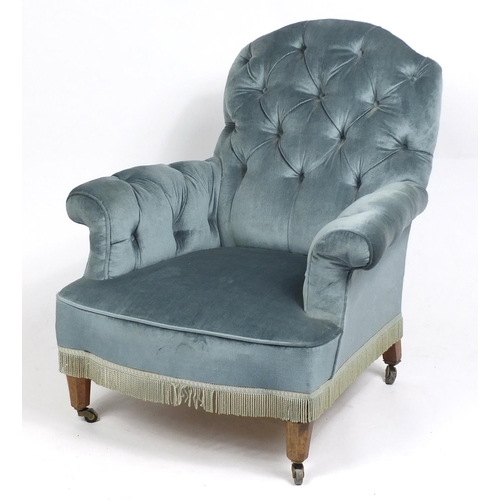 1547 - Blue button back upholstered chair on octagonal walnut tapering legs, 88cm high