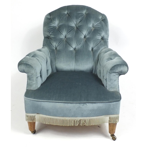 1547 - Blue button back upholstered chair on octagonal walnut tapering legs, 88cm high