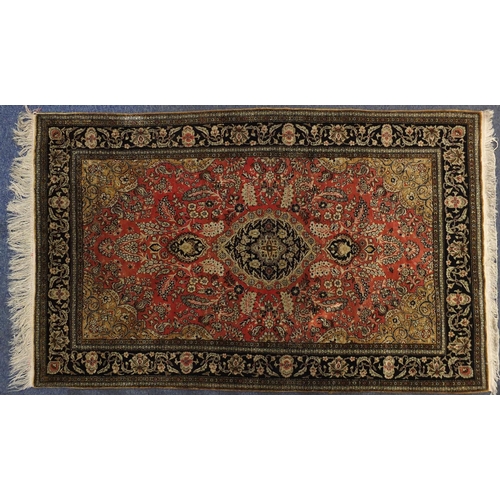 1532 - Rectangular Persian Qum silk rug having all over floral design, 171cm x 108cm