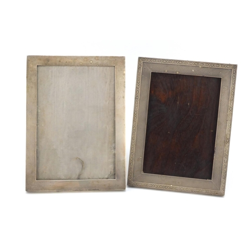 3052 - Two rectangular silver easel photo frames, one with engine turned decoration, hallmarked Birmingham ... 