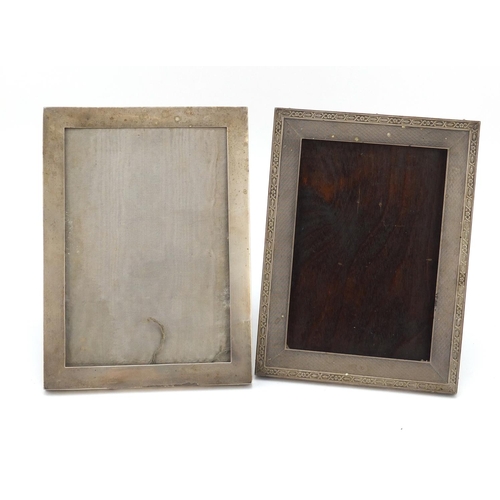 3052 - Two rectangular silver easel photo frames, one with engine turned decoration, hallmarked Birmingham ... 