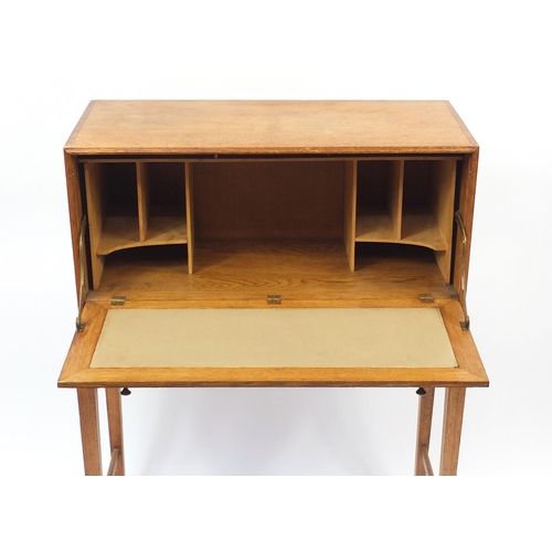 1480 - Arts & Crafts oak student's bureau on stand with a fall above two drawers, 109cm H x 79cm W x 33cm D