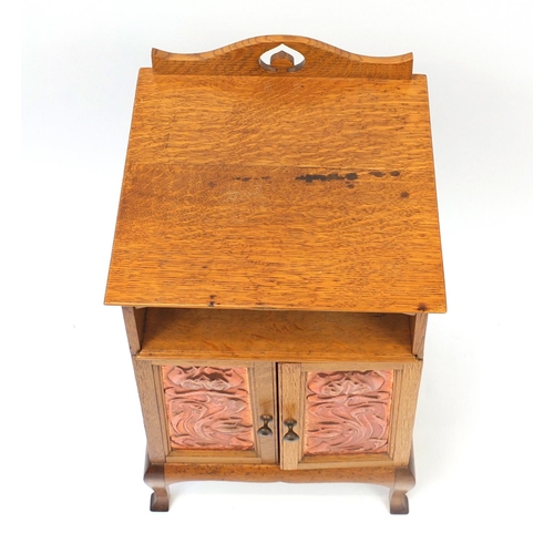 1466 - Liberty & Co style, Arts & crafts oak night stand having copper handles and doors embossed with styl... 