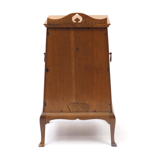 1466 - Liberty & Co style, Arts & crafts oak night stand having copper handles and doors embossed with styl... 