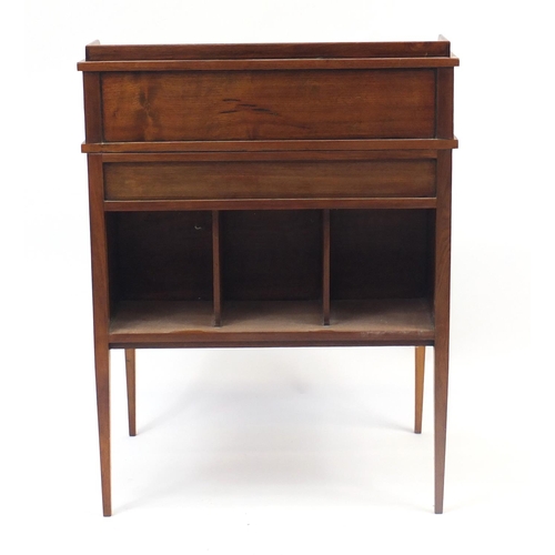 1486 - Liberty & Co, Arts & Crafts walnut student's bureau with a fall above a drawer and open shelf, 83cm ... 