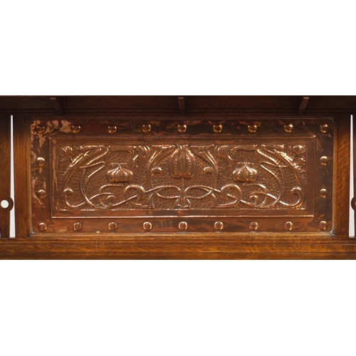 1450 - Liberty & Co, Arts & Crafts oak sideboard with embossed copper panels and Ruskin type cabochon round... 