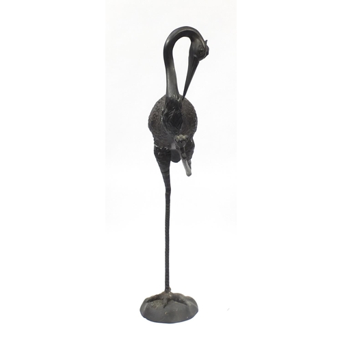 1487 - Floor standing patinated bronze stork, 138cm high