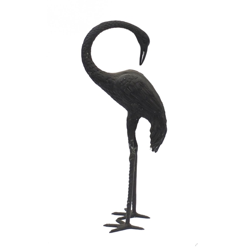 1489 - Floor standing patinated bronze stork, 83.5cm high