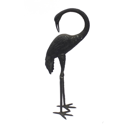 1489 - Floor standing patinated bronze stork, 83.5cm high