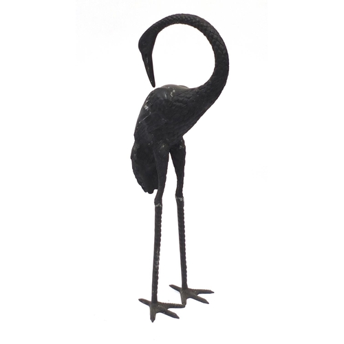 1488 - Floor standing patinated bronze stork, 83.5cm high