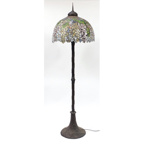 1526 - Art Nouveau design bronze standard lamp with Tiffany design leaded shade, 203cm high