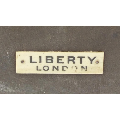 11 - Liberty & Co, Arts & Crafts planished brass and copper mirror with embossed roundels, Liberty London... 