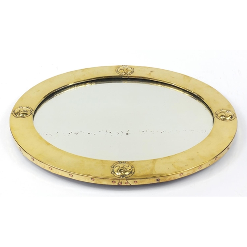 11 - Liberty & Co, Arts & Crafts planished brass and copper mirror with embossed roundels, Liberty London... 