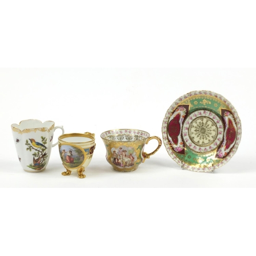 98 - Continental porcelain including a hand painted Augustus Rex cup and a Vienna style cup with paw feet... 