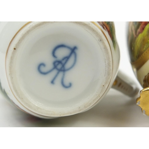 98 - Continental porcelain including a hand painted Augustus Rex cup and a Vienna style cup with paw feet... 