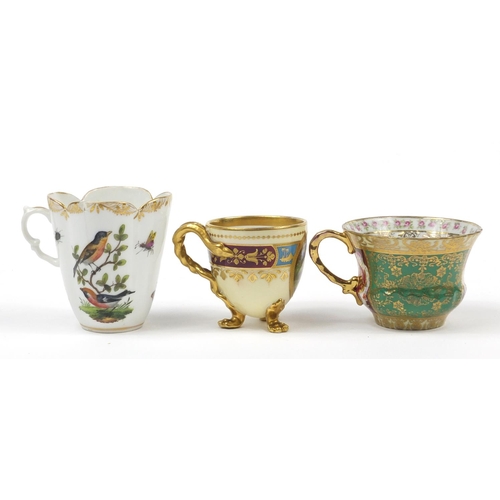 98 - Continental porcelain including a hand painted Augustus Rex cup and a Vienna style cup with paw feet... 