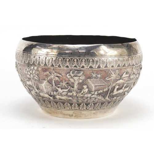 3075 - Burmese silver coloured metal bowl embossed with farmers, cattle, hunters and wild animals, 11cm hig... 