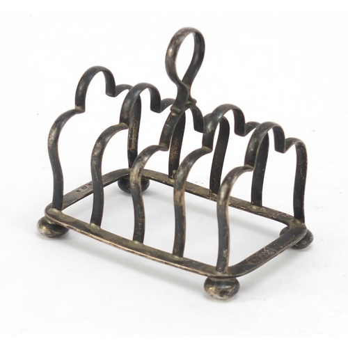 3039 - Marples & Co, Edward VII silver four slice toast rack, Birmingham 1902, 10cm wide, 125.5g