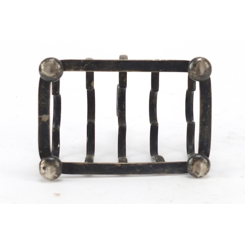 3039 - Marples & Co, Edward VII silver four slice toast rack, Birmingham 1902, 10cm wide, 125.5g