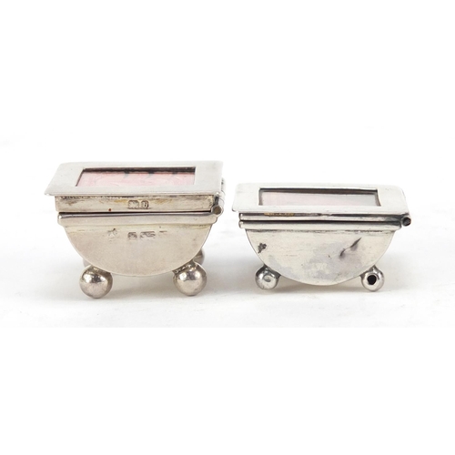 3060 - Two Victorian and later silver stamp boxes with hinged lids, each raised on four ball feet, Birmingh... 