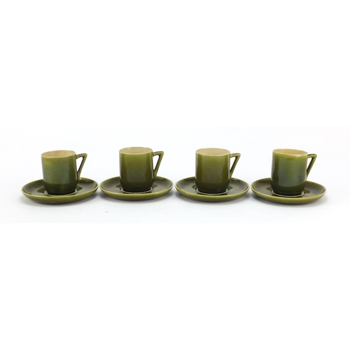 58 - Four Linthorpe Arts & Crafts pottery coffee cans and saucers having green glazes in the manner of Ch... 