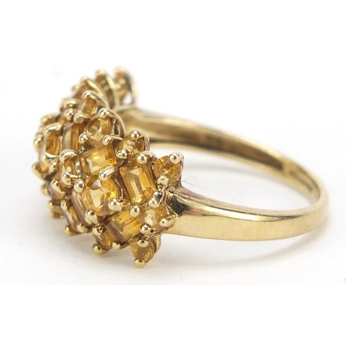 2329 - 9ct gold orange stone cluster ring, possibly citrine, size N/O, 2.9g