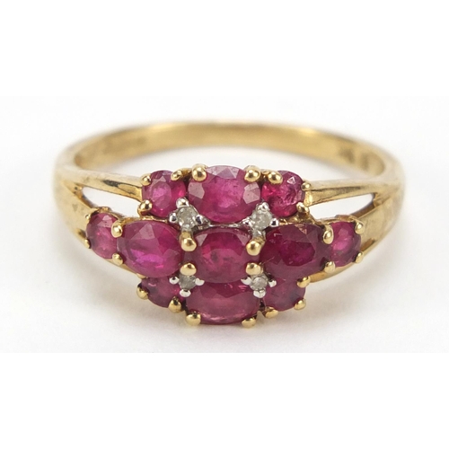 2335 - 9ct gold ruby and diamond cluster ring, size O, 2.4g