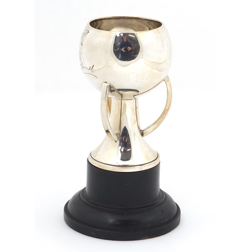 3038 - Arts & Crafts silver trophy with R.G. England inscription, raised on an ebonised stand, London 1869,... 