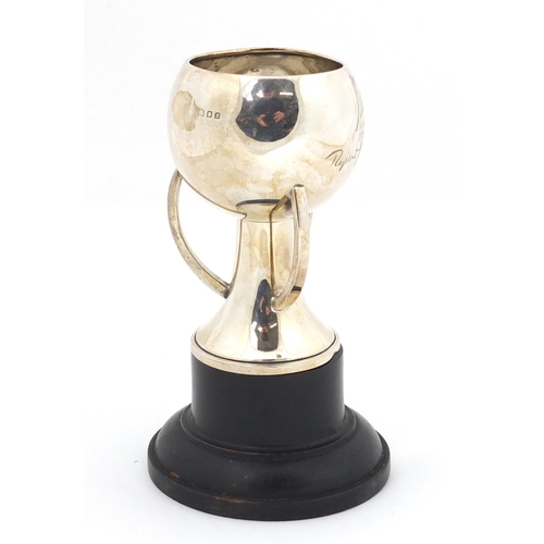 3038 - Arts & Crafts silver trophy with R.G. England inscription, raised on an ebonised stand, London 1869,... 