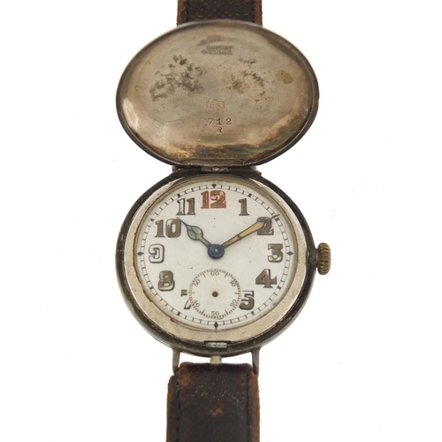 2405 - Military interest wristwatch with luminous dial and case by George Stockwell, 34mm in diameter