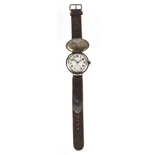 2405 - Military interest wristwatch with luminous dial and case by George Stockwell, 34mm in diameter