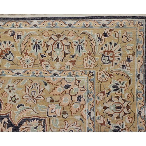 1495 - Rectangular Persian Qum silk rug having all over stylised floral design onto midnight blue and beige... 